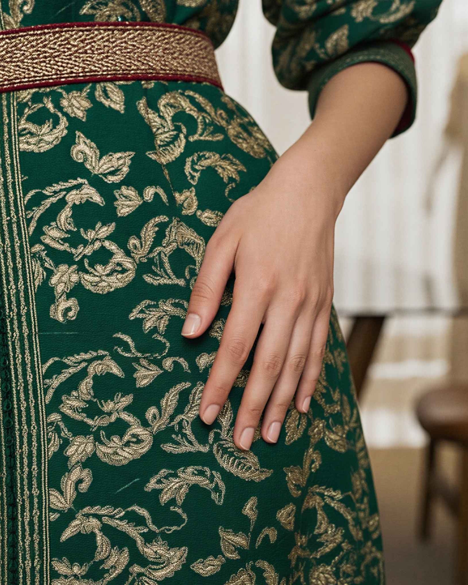 Ivory Dawn kaftan waist and sleeve embroidery detail in green and gold