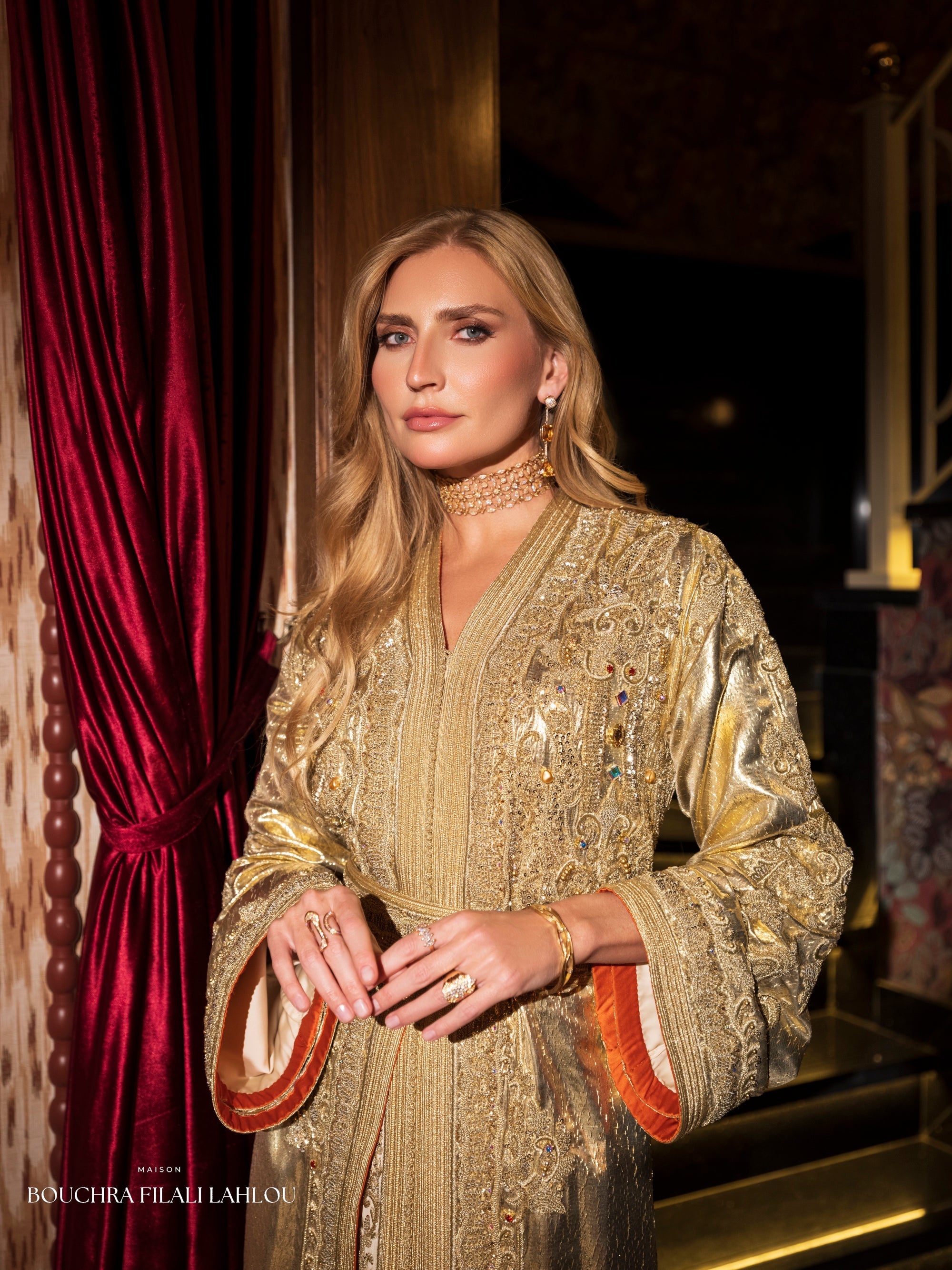 Luxury gold caftan dress with ornate embroidery and refined evening silhouette